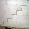 A diagonal stair step crack along the foundation wall of a York home